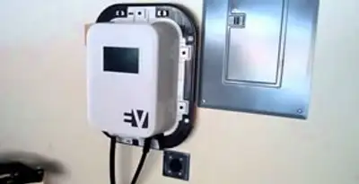 Electric car charger installation with wall-mounted EV charging station in Ogden, UT