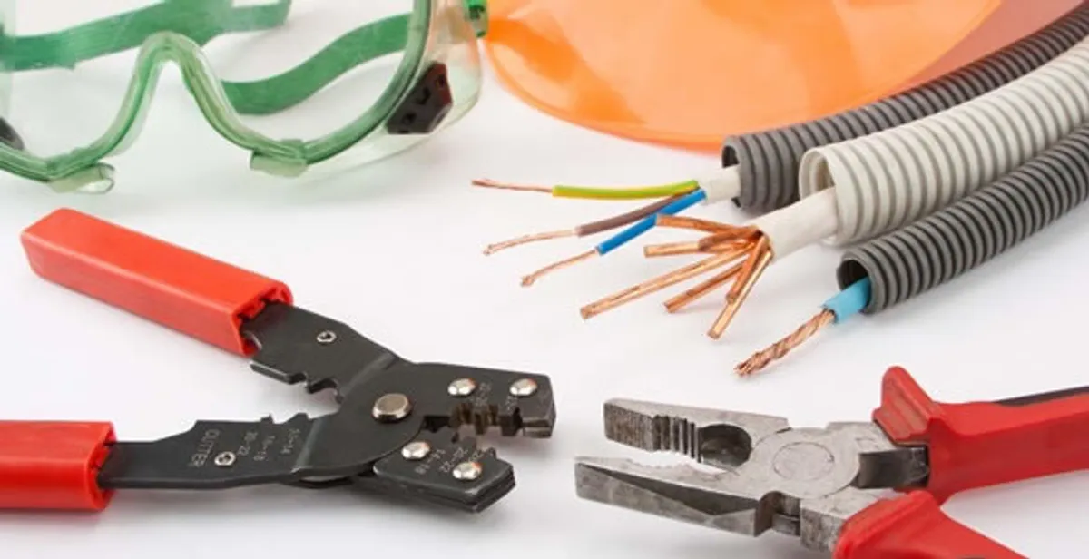 Electrical wiring repair with professional tools and safety equipment in Clearfield, UT