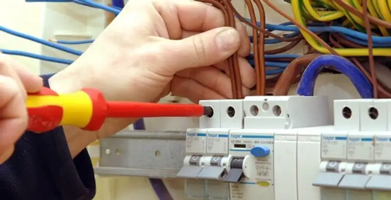 electrician services performing professional electrical panel wiring and connections in Ogden, UT