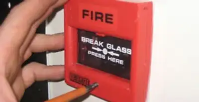 fire alarm installation service showing manual fire alarm pull station installed by licensed electricians in Ogden, UT