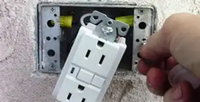 gfci circuits service showing installation of a ground fault circuit interrupter outlet by licensed electricians in Ogden, UT