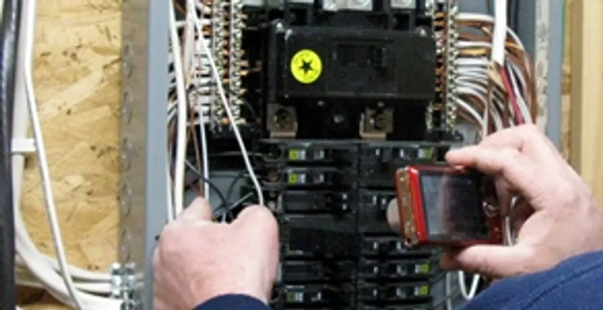 Home electrical inspection of circuit breaker panel by licensed electrician in Ogden, UT