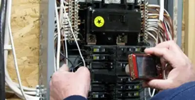 Home electrical inspection of circuit breaker panel by licensed electrician in Ogden, UT