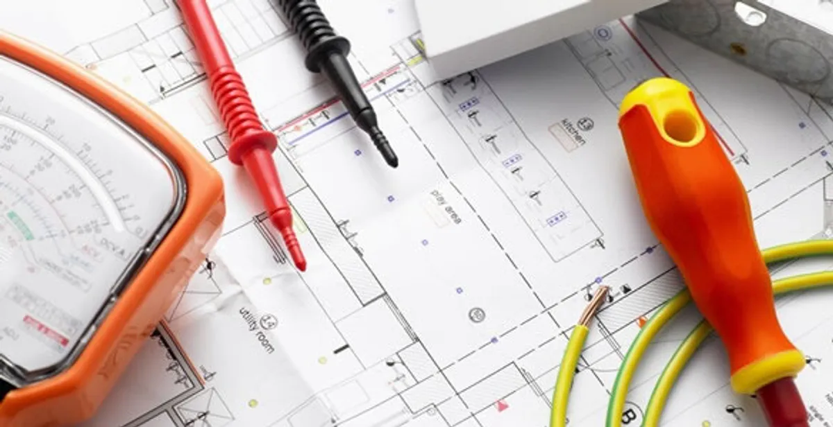 licensed electrician planning and testing electrical systems using professional tools in Ogden, UT