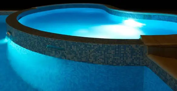 pool light installation and repair services highlighting illuminated pool interior lighting in Ogden, UT