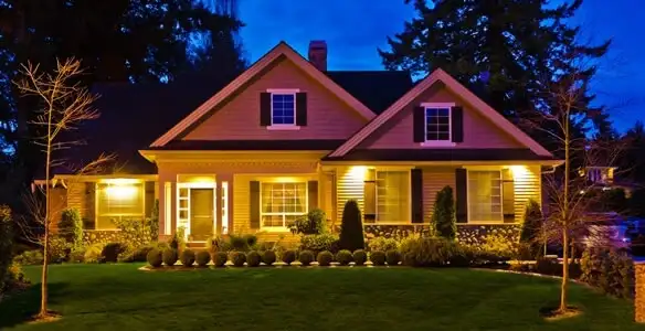 security light installation services illuminating a residential exterior at night in Ogden, UT