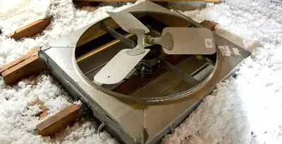 whole house fan installation services with attic-mounted ventilation unit in Ogden, UT